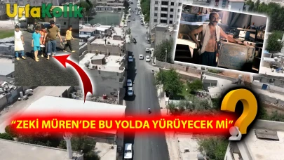 Suruç'ta Vizontele'yi andıran an: Yerlerdeki asfaltı hissetmek için vatandaşlar ayakkabılarını çıkardı